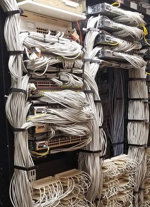 Organized commercial server rack and vertical management after Aaron Tech cleanup